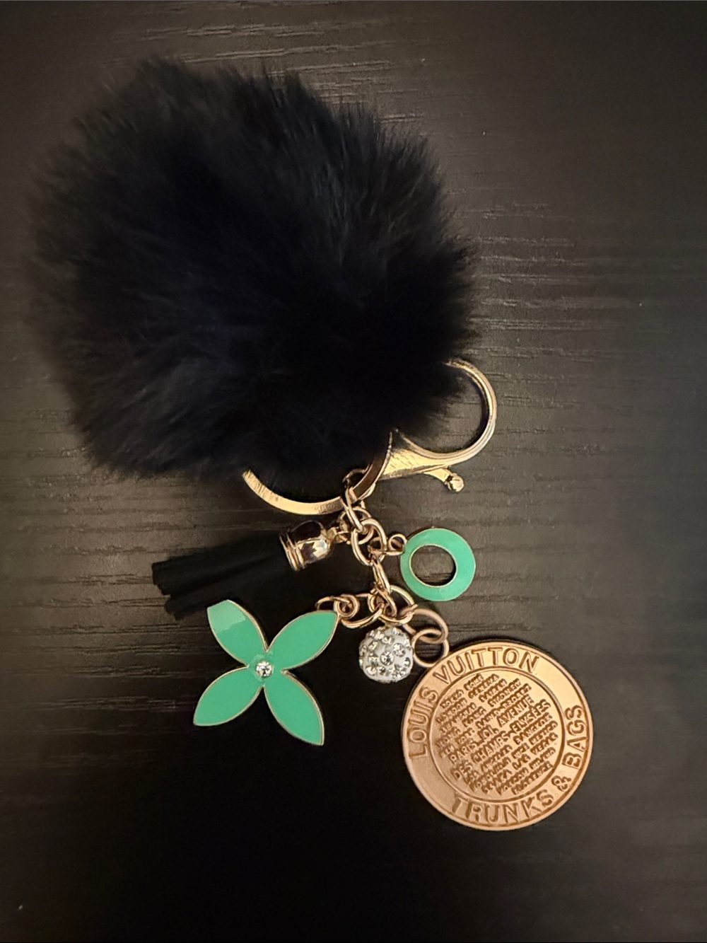 Inspired Black Pom Pom Key Charm with Green Flower and Gold Medallion